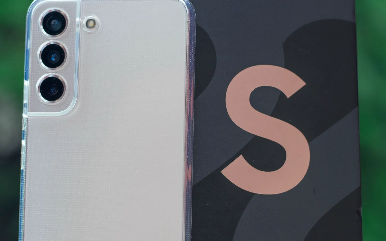 A Samsung Galaxy phone beside its box