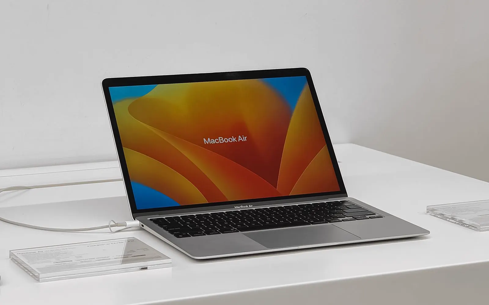 A MacBook Air on display against a plain background