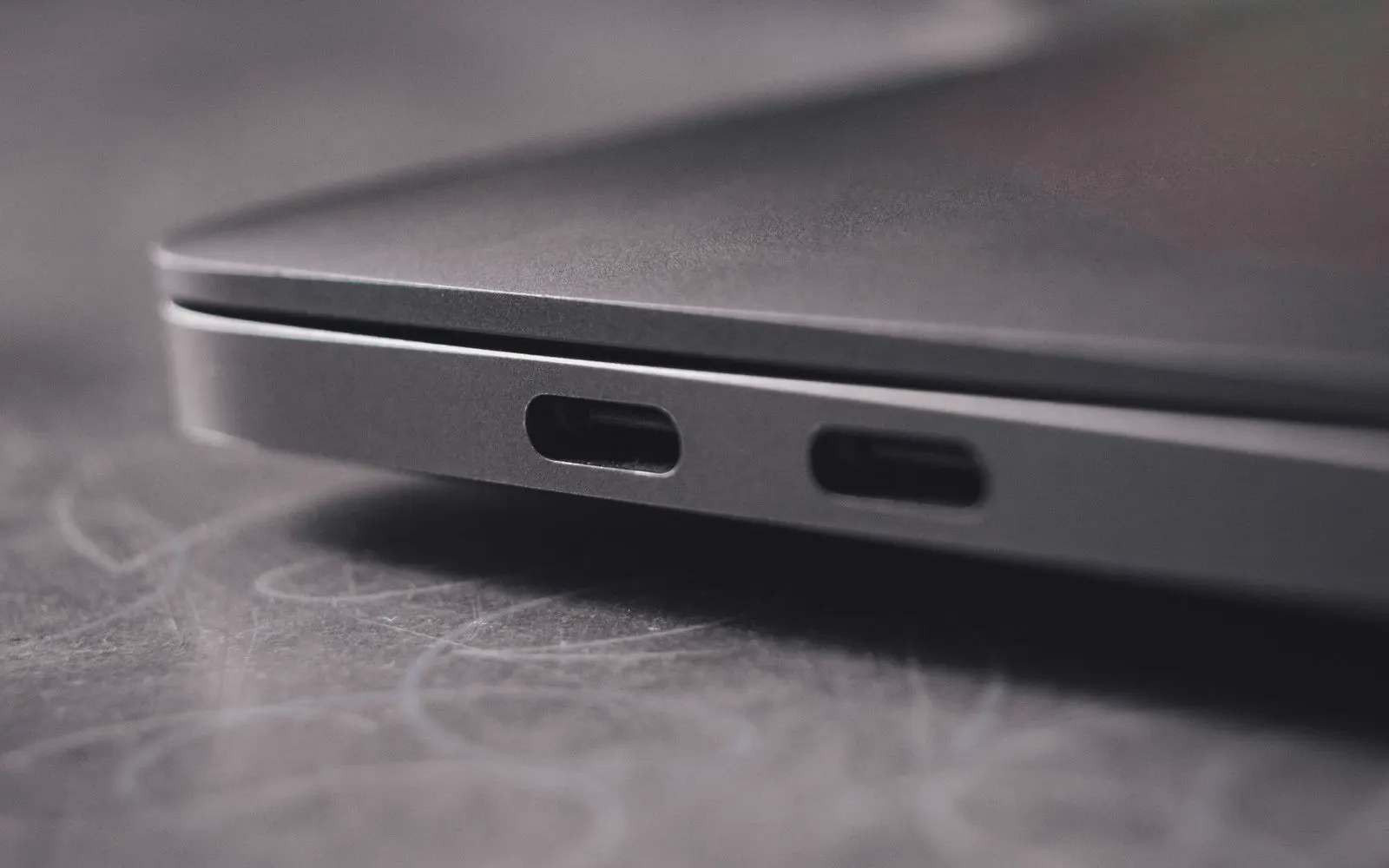 A close-up of a laptop's USB-C ports